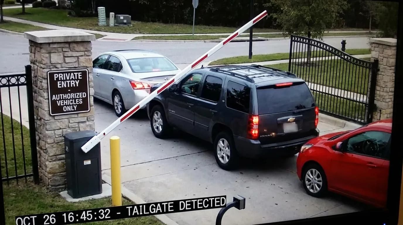 Security officer managing gated community entrance